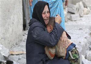 في سوريا.. 10 أطفال يقتلون كل يوم (صور)