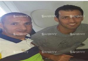 بالصور.. نجم برشلونة يرافق بعثة الأهلي على طائرة مدريد