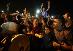 مسيحيو قراقوش يحتفلون بتقدم القوات العراقية في مدينتهم القريبة من الموصل