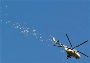 الطيران السوري يلقي منشورات فوق الأحياء الشرقية لحلب لتوضيح معابر الخروج