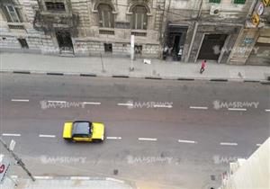 بالصور.. هدوء بميادين الإسكندرية.. وسيارات"تسلم الأيادى" تجوب وسط المدينة