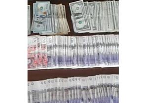 القبض على خليجي لاتهامه بالإتجار في النقد الأجنبي بالسوق السوداء بالنزهة