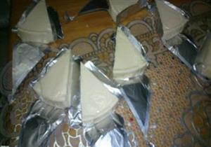 ضبط مليوني عبوة جبن مُثلثات مغشوشة بالقناطر الخيرية