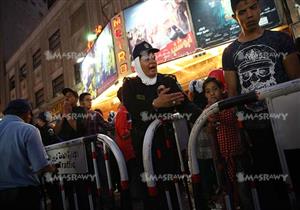 بالصور.. "الشرطة النسائية" تكافح التحرش أمام سينمات وسط البلد