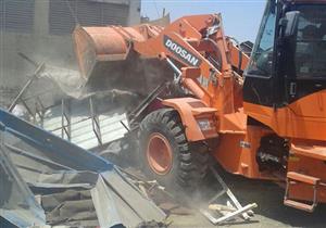 بالصور.. شرطة المرافق تشن حملة مكبرة لإزالة إشغالات "سوق أكتوبر"