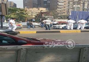 بالصور.. الشرطة تتابع إزالة سور نادي الزمالك المخالف بالعجوزة