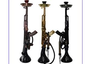 ‏‫ضبط 180 شيشة وحجر على شكل بنادق آليه وقنابل يدوية بالجمالية