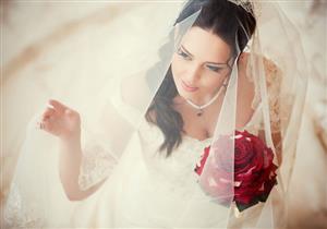 أصول تقاليد الزفاف.. الباقة من الثوم والطرحة لمنع الهرب