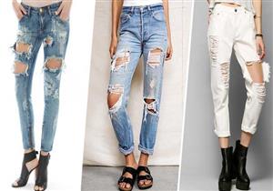 الجينز الممزق يكتسي باللون الأبيض