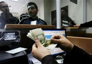 إهدار الدولار على البسكويت..أسباب فرض المركزي غرامات على بنوك تلاعبت في العملة