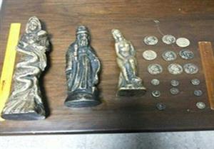 ضبط 3 تماثيل أثرية و21 ألف جنيه بحوزة موظف سابق وسائق بالجيزة