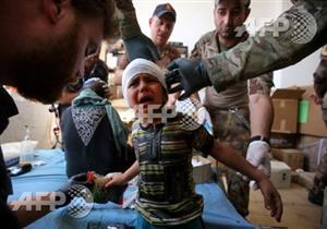 صورة وخبر: رحلة نزوح وصرخات طفل في الموصل