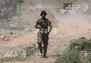 صورة وخبر: استمرار معركة الموصل وجندي في ساحة قتال 