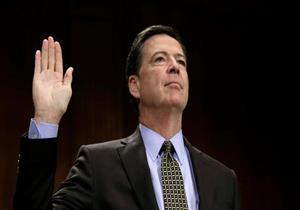 كومي يعتبر المناقشة مع ترامب طلبا لإسقاط التحقيق بشأن فلين