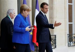 "ماكرون" يستقبل "ترامب" بسلام الشرف العسكري 