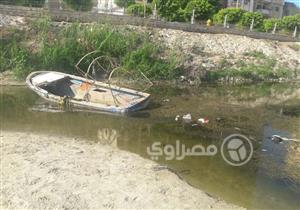 بالصور- جزر طينية بنيل الدقهلية بسبب "السدة الشتوية".. وصيادون: "حالنا اتوقف"