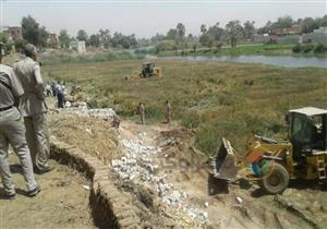 بالصور.. حرم نيل المنيا يتحول لكتل خرسانية.. وأهالي: "الصرف يصب في مجرى النهر"