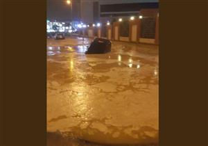 هبوط أرضي يبتلع سيارة ملاكي في التجمع الخامس.. و"الحماية" تنقذ مستقليها