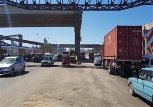 بالصور– "هيئة ميناء الإسكندرية" توضح حقيقة حدوث انهيار جزئي بكوبري الدخيلة