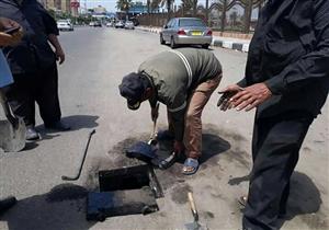 بالصور- حملة لتطهير بالوعات الأمطار في بورسعيد