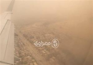 خاص| تصوير من الطائرة.. لحظة وصول العاصفة الترابية للقاهرة