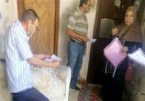 بالصور- بدء تحصيل متأخرات الإيجارات من أهالي بورسعيد