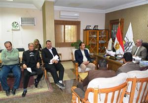 سوهاج تبحث تنفيذ قانون البناء الموحد