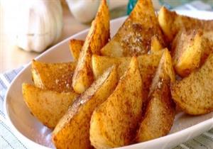 طريقة عمل بطاطس ودجز بالأعشاب