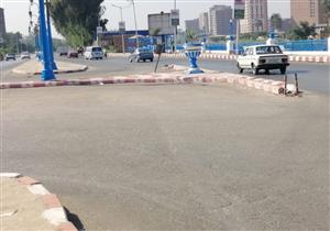 بالصور.. طلاب يشاركون في تجميل شوارع أسيوط