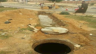 اختناق عاملين سقطا داخل بالوعة صرف بأطفيح