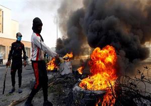 العراق: محتجون يحرقون مقار أحزاب سياسية بالديوانية