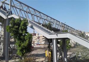 حفاظًا على حياة الطلاب.. استكمال كوبري المشاة بطريق الإسكندرية الصحراوي -صور