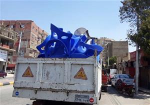  شرطة المرافق تتصدى لإشغالات شارع التحرير في الدقي