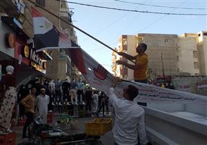 لعدم الحصول على تصاريح.. إزالة لافتات مرشحي النواب في الإسكندرية- صور 