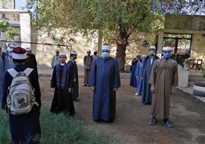 صور.. انتظام الدراسة في معاهد أسيوط الأزهرية وسط إجراءات احترازية