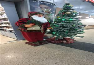 بأشجار الكريسماس و"بابا نويل".. مطار القاهرة يستعد لاستقبال العام الميلادي الجديد