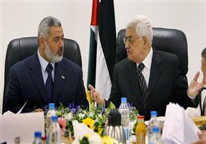 أبو مازن وهنية مكبلا اليدين ومعصوبا العينين في إعلانات بتل أبيب