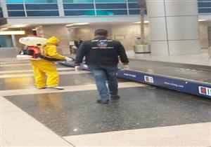  انتشار فرق التعقيم في مطار القاهرة لمكافحة "كورونا" (صور)