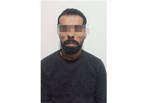 متهم بقتل ابن شقيقه يطعن مسجل داخل حجز قسم الجيزة "بسبب السجاير"