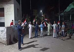 استقبلوه بالأعلام.. أهالي "كفر الور" يحتفلون بمتعافى من "كورونا" 