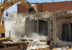 بالصور..هدم عقارات مخالفة في بورسعيد