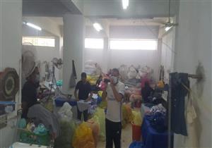 بالصور.. ضبط مصنع ملابس وكمامات غير مرخص بالقليوبية