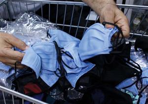 ضبط ١٠٠ ألف كمامة مغشوشة في مصنع بالبدرشين