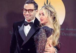 فهمي وهنا الزاهد على الريد كاربيت ببدلة سودة وفستان جريء