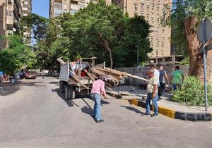 إزالة لافتات انتخابية بدون تصريح من ميدان النهضة ومحيط جامعة القاهرة (صور)