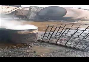 الأسود والأبيض يطبقان على المشهد.. إخماد حريق هائل بمصنع زيوت مجاور لمحطة كهرباء أطفيح