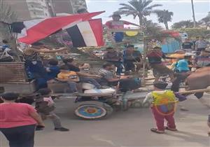 سمك مشوي وفاكهة.. موكب شعبي احتفالًا بالمولد النبوي في كفر الشيخ- صور