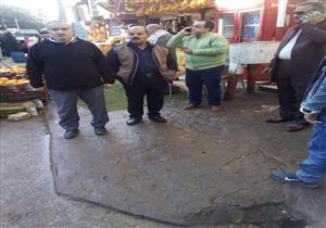 جزار يعتدي على مدير عام الطب البيطري بالفيوم- صور