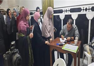 استخراج بطاقة الرقم القومي لـ 152 سيدة بالمجان في الإسكندرية- صور