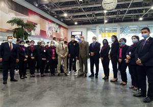 ورود وشيكولاتة وتشديدات أمنية.. كيف تم استقبال بعثة الأهلي بمطار القاهرة؟ صور